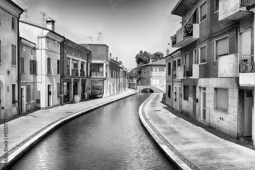 Walking among the picturesque canals of Comacchio, Italy