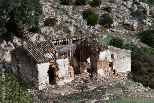 Ruins of house (Casa del Hoyo) along footpath in El Caminito del Rey (The King's Little Path) near El Chorro, Malaga, Spain, in mountain ranges of Baetic System in southern Iberian Peninsula