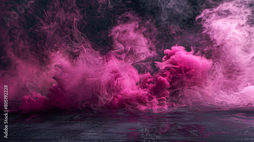 Bold neon pink smoke curls and twirls against a slate gray floor. photo