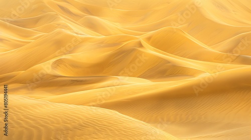 A vast expanse of golden sand stretches into the horizon, illuminated by the soft glow of dawn's first light. The gentle curves of the dunes create a symphony of shadows and highlights, 