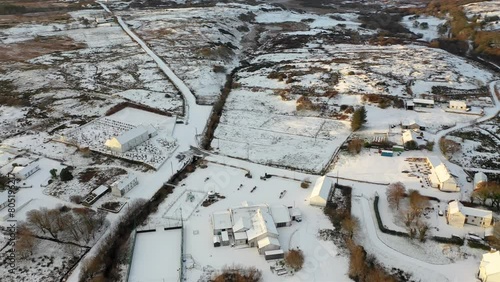 Aerial view of a snow covered Kilclooney by Portnoo, Ireland photo