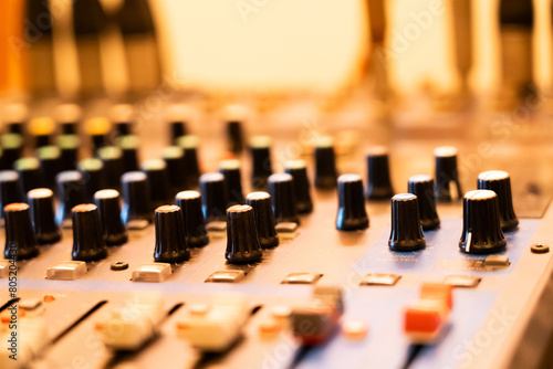 Hi-Fi system console control panel audio equipment Close-up of digital studio mixer control panel Use blurring techniques