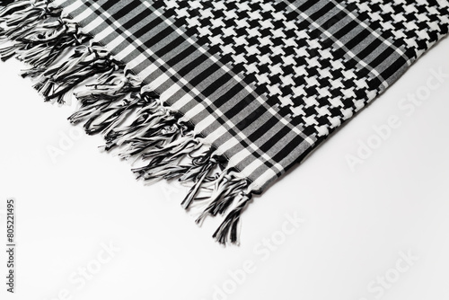 Keffiyeh, hijab, kandura or pushi, head covering commonly used in the Middle East and the Arab World. Keffiyeh is a traditional pattern garment tied to the head. photo