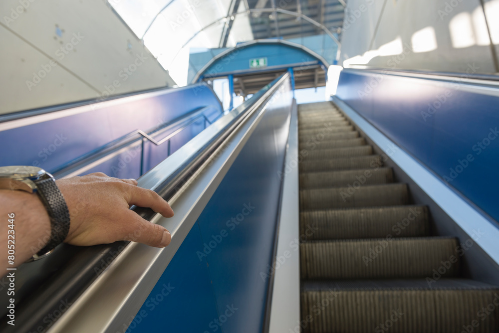 Personal Perspective of a Man Travel in a Escalator in switzerland.