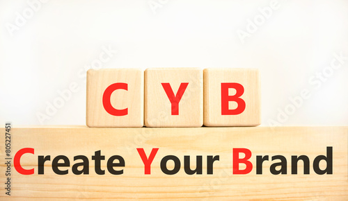 CYB Create your brand symbol. Concept words CYB Create your brand on beautiful wooden blocks. Beautiful white background. Business CYB Create your brand concept. Copy space.