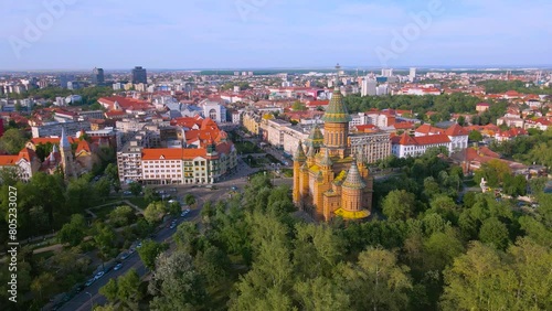 Aerial view of the beautiful city of Timisoara, Romania. Footage was shot from a drone at a higher altitude with the Mitropolitan Cathedral and The Victory Square in the view.