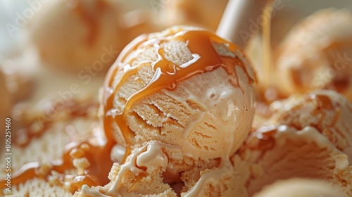 A luxurious scoop of caramel ice cream melting slowly, sticky caramel dripping down the sides, epitomizing sweet indulgence photo