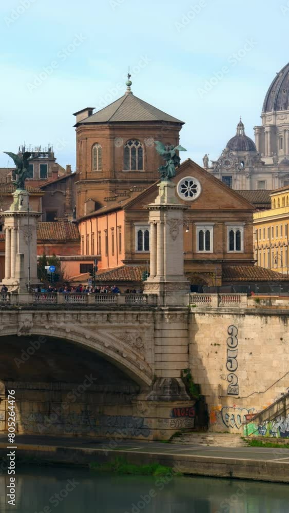 Marble statue of angel on Saint Angel Bridge in Rome, Italy. Vertical Marble statue of angel on Saint Angel Bridge in Rome, Italy. Vertical