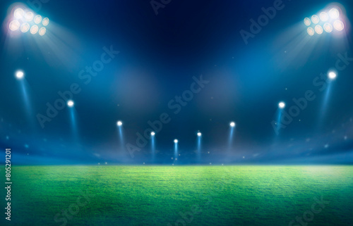 Green soccer field, bright spotlights,	