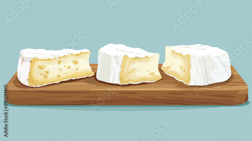 Wooden board with pieces of tasty Camembert cheese