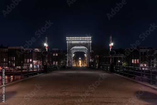 The Magere Brug (Skinny Bridge) in Amsterdam at night completely empty