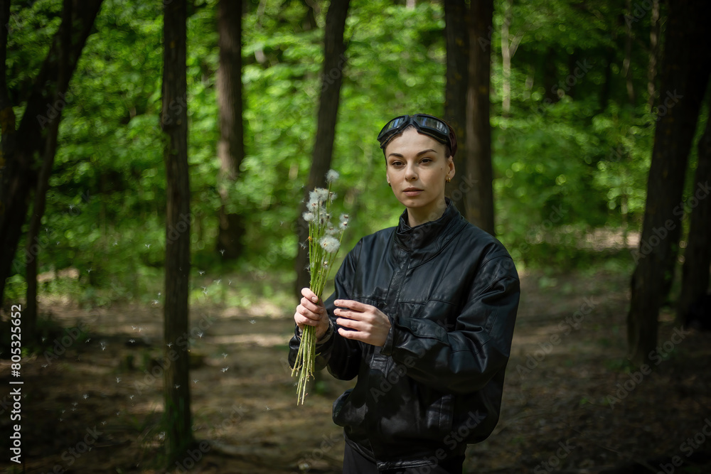 Girl Walking Through Forest Holding Dandelions Girl Walking Through Forest Holding Dandelions
