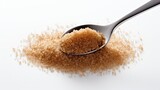 spoonful brown sugar white background