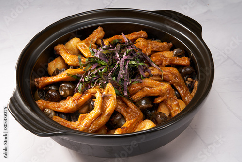 A pot of delicious and fragrant screws, snails and duck feet in a pot