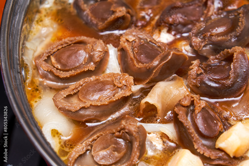 A pot of sumptuous and luxurious Chinese New Year Poon Choi, delicacies from both mountains and seas A pot of sumptuous and luxurious Chinese New Year Poon Choi, delicacies from both mountains and seas