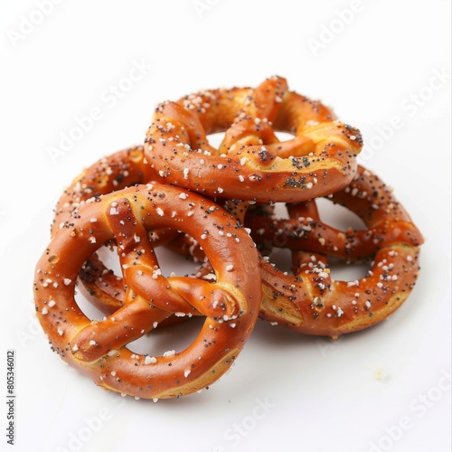 A pile of pretzels neatly stacked on a white table