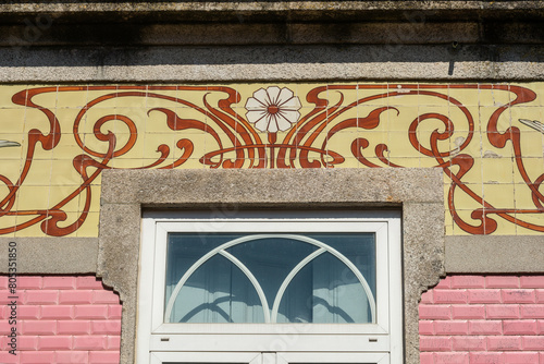 detail of an art nouveau azulejos frieze on a house in Braga, Portugal