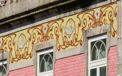 detail of an art nouveau azulejos frieze on a house in Braga, Portugal