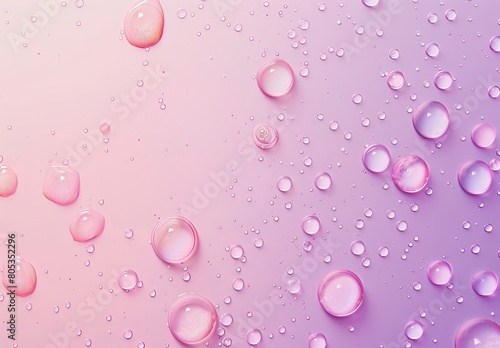 Soft pink water droplets of various sizes scattered across a smooth pink surface