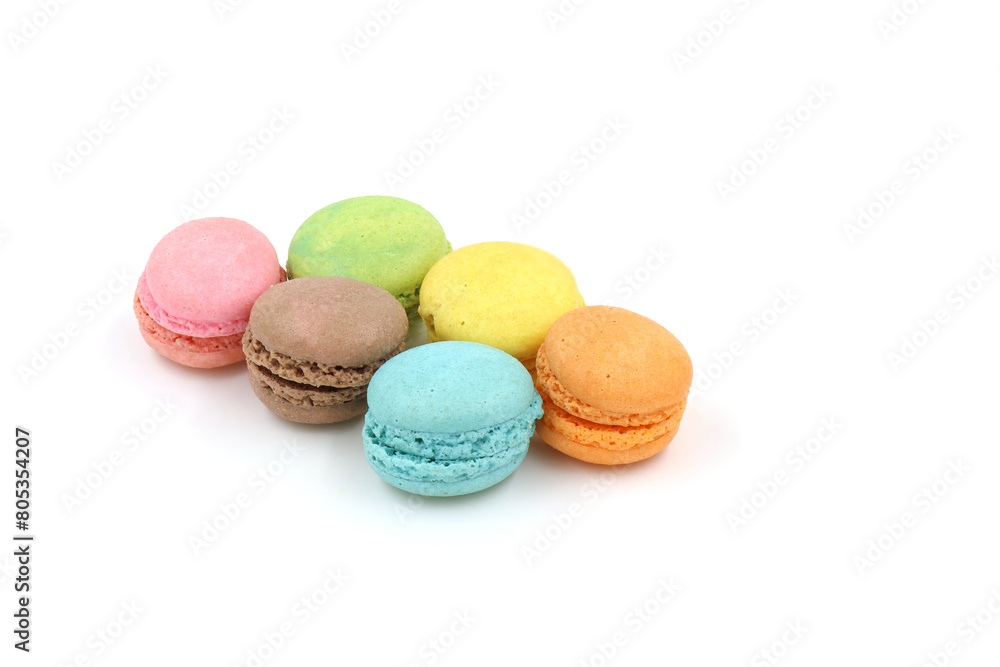 Obraz premium Sweet colorful macarons isolated on white background. Tasty colourful macaroons.
