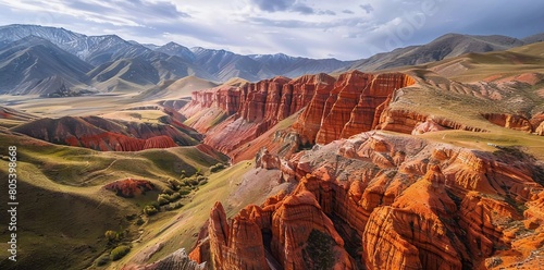 Eroded mountain landscape, canyon with red and orange rock formations, aerial view, Konorchek Canyon, Chuy, Kyrgyzstan photo