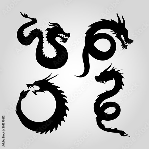 Set of vector silhouettes of dragons