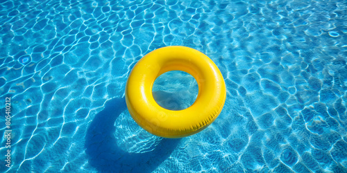 Yellow Pool Ring Floating in Calm Blue Water Symbolizing a Colourful Summer