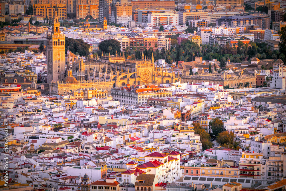 Obraz premium Aerial view of Seville downtown, with the Giralda tower, the Cathedral and the Archivo de Indias building, among other landmarks, Spain.