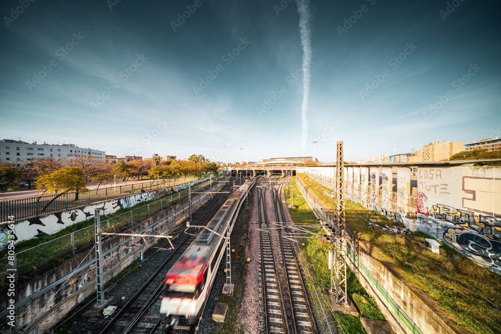 Fototapeta premium Approaching Train at Santa Justa Station, Seville at Dusk