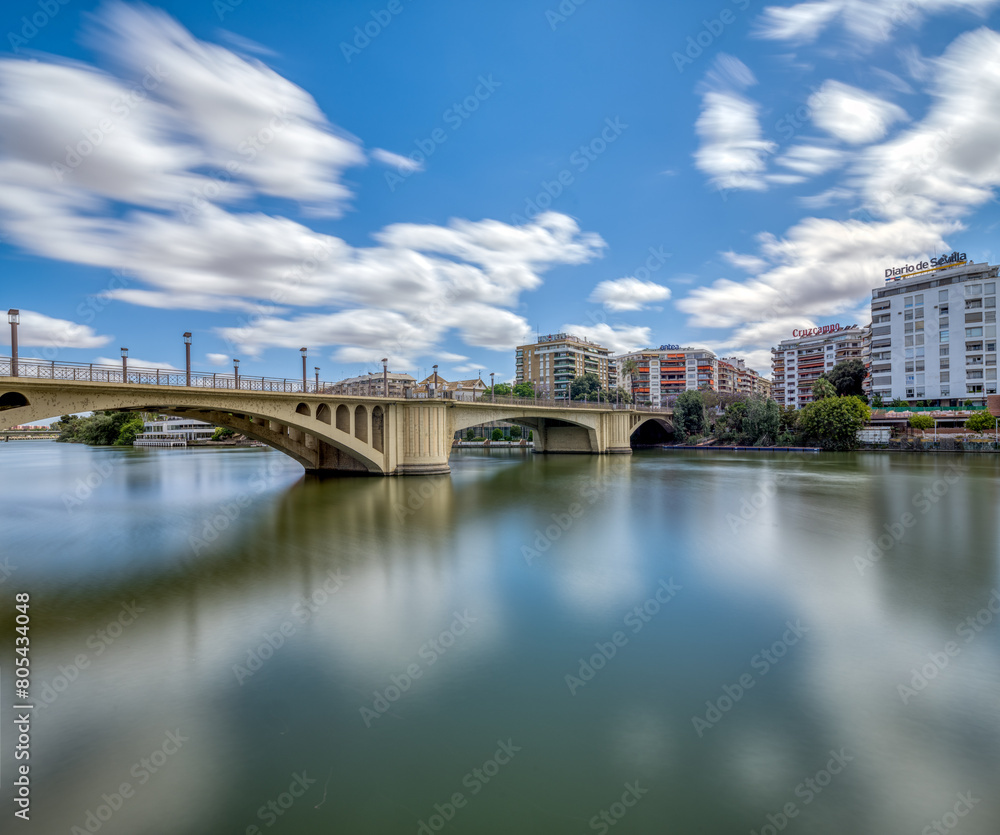 Naklejka premium San Telmo Bridge (1931), Seville, Spain. Long exposure shot.