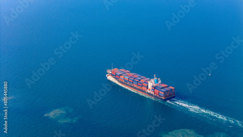 Top view Container ship full capacity approaching the port International Container ship loading, unloading at sea port, Freight Transportation, Shipping,  