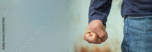 Photos Man clenches his fist tightly in anger, hand close up, emotion concept, stock ph