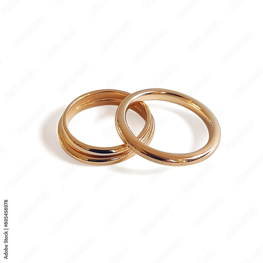 Two golden wedding rings isolated on a transparent background
Two golden wedding rings isolated on a transparent background