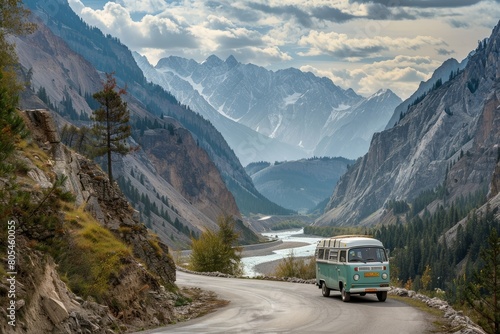 A tourist minibus travels along a picturesque winding mountain road along the river, the concept of recreation and tourism