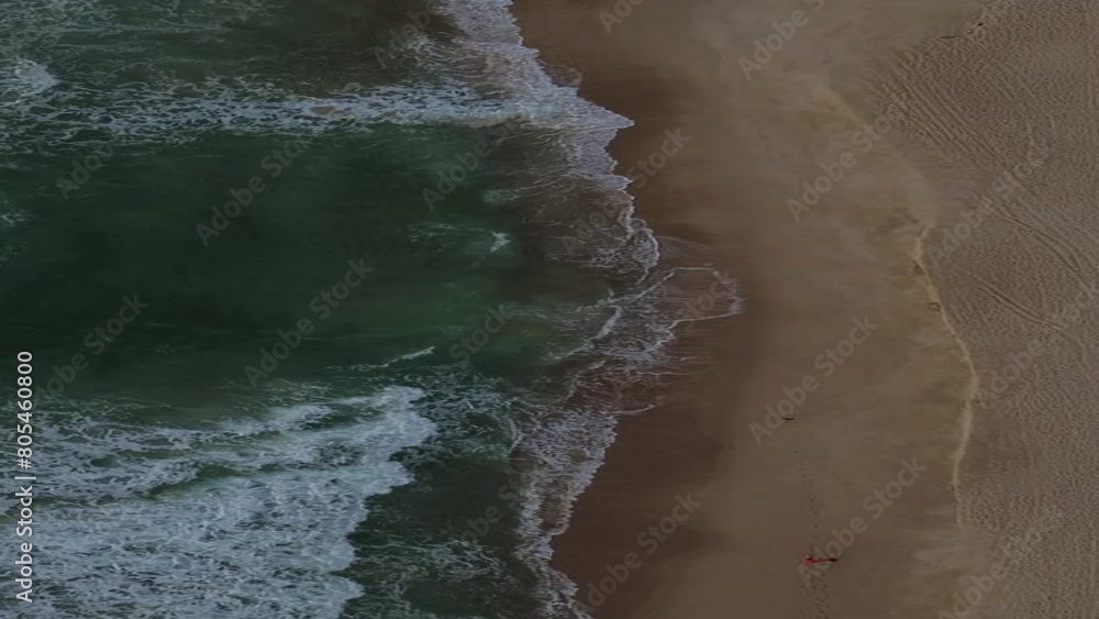 waves calmly flowing to the beach waves calmly flowing to the beach