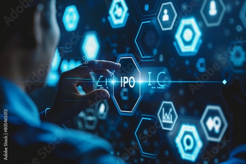 A man is pointing at the letters IPO on a computer screen