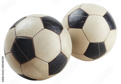 Two classic black and white leather soccer balls isolated on transparent background
