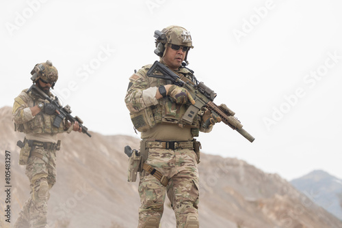 Soldiers patrol in afghanistan © charnsitr