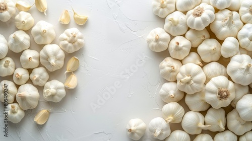  Two piles of garlic, each atop a table