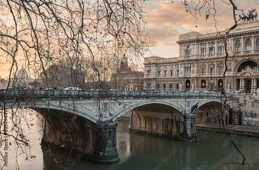 Fototapeta premium A magnificent bridge gracefully spans over a bustling body of water in the heart of a vibrant city. The bridge is a symbol of connection and unity, contrasting with the fast-paced city life below