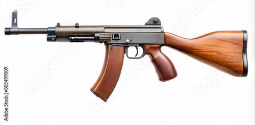 Side view of a vintage submachine gun with polished wooden stock and retro design. Perfect for firearm enthusiasts, or military equipment photography showcasing classic weaponry photo