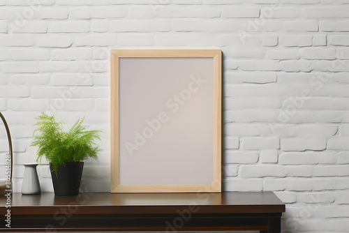 Empty wooden picture frame mockup hanging on white brick wall background