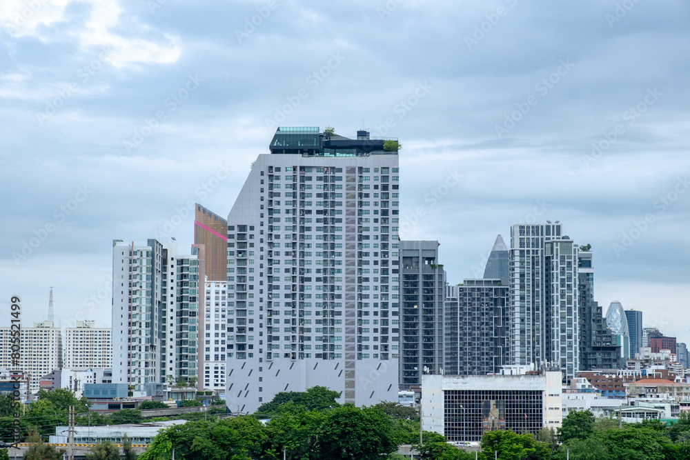City background with urban residence and business building in Bangkok