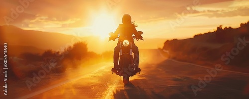 Front view of the motociclist ride in the sunset. Rider on the road.