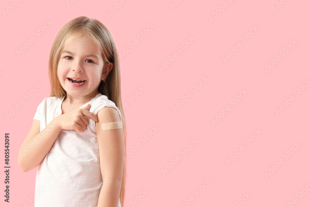 Little girl with patch after vaccination on pink background Little girl with patch after vaccination on pink background