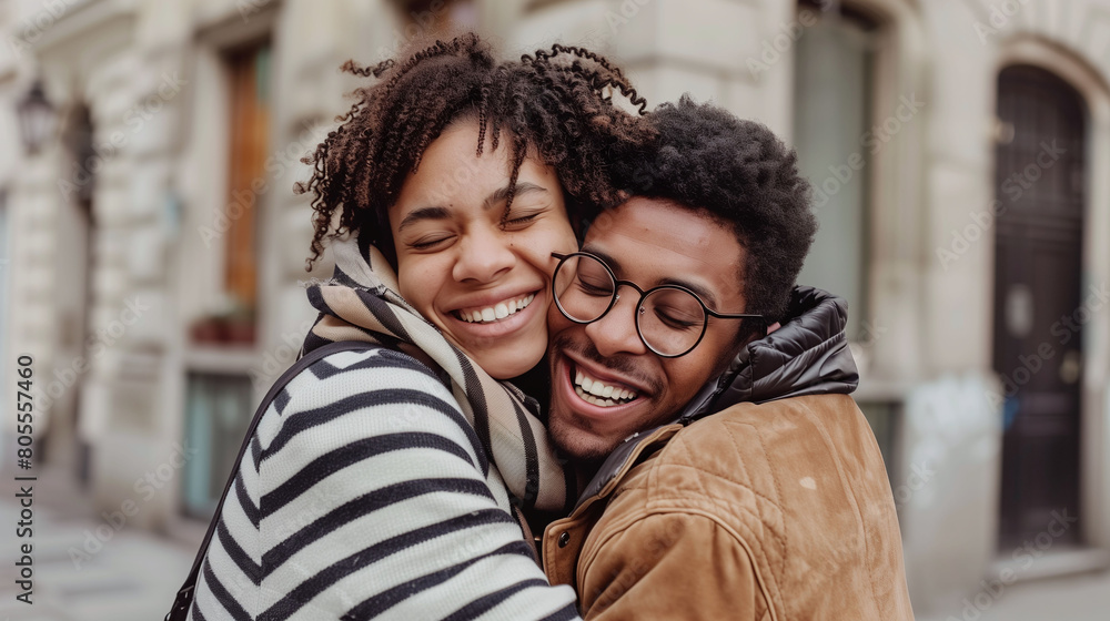 Warm Embrace Between Young Black Couple on City Street