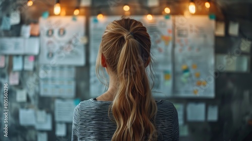 Woman With Long Hair Standing in Front of Desk