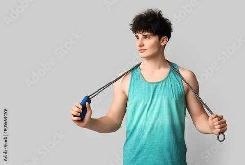 Young man in athletic tank ...