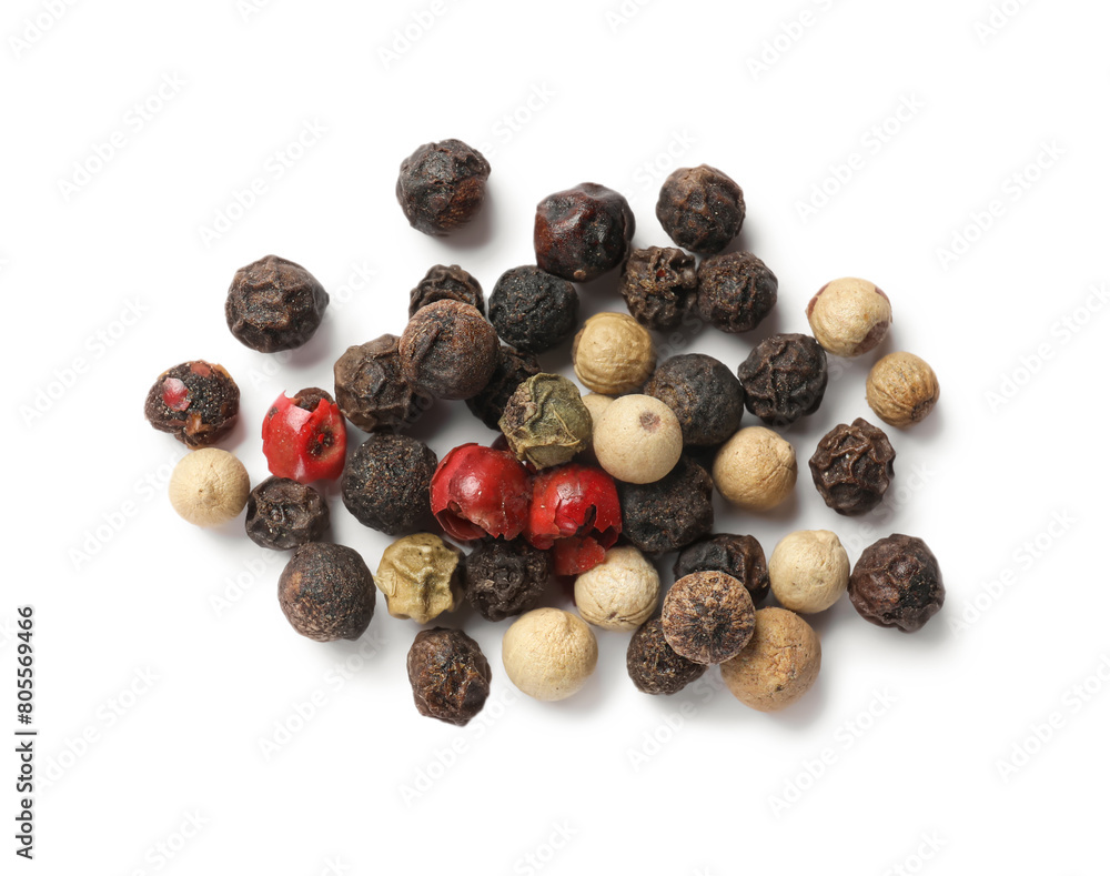 Aromatic spices. Pile of different peppers isolated on white, top view Aromatic spices. Pile of different peppers isolated on white, top view