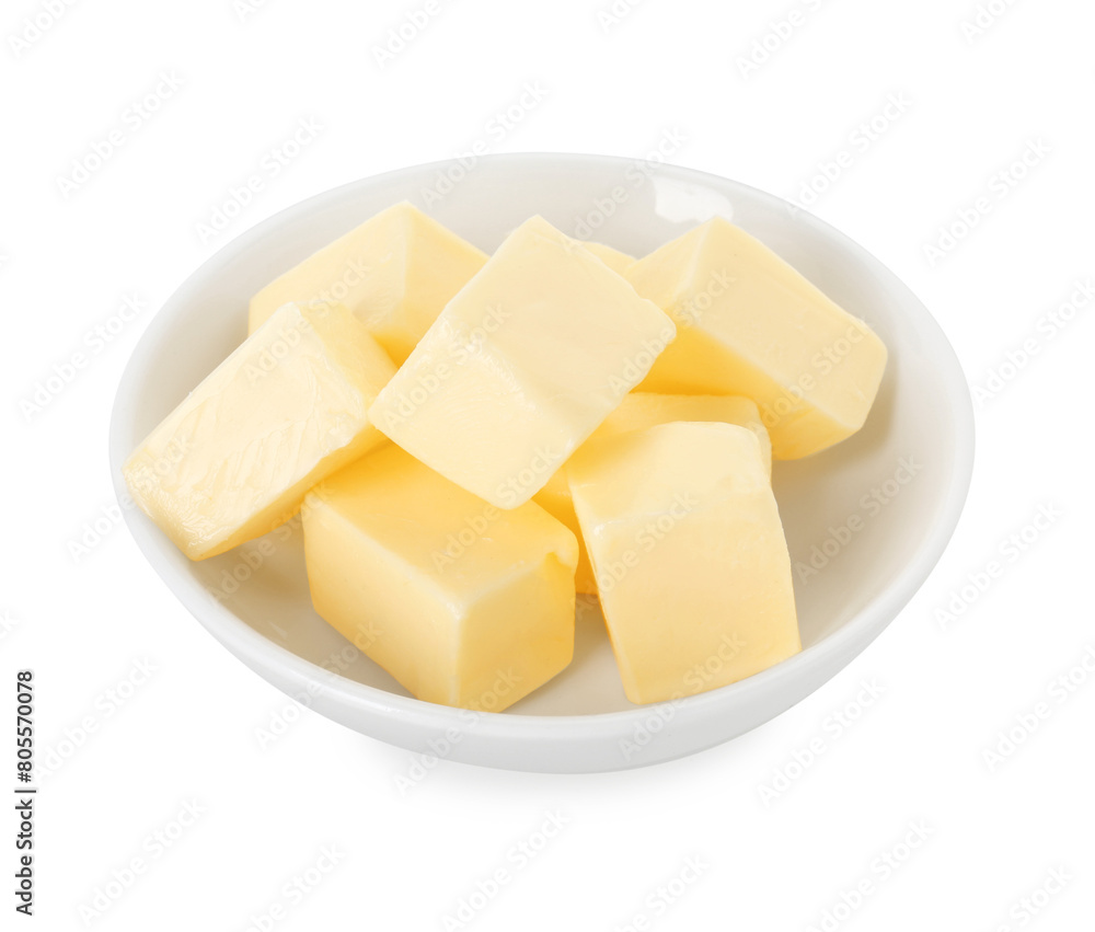 Tasty butter cubes in bowl isolated on white Tasty butter cubes in bowl isolated on white